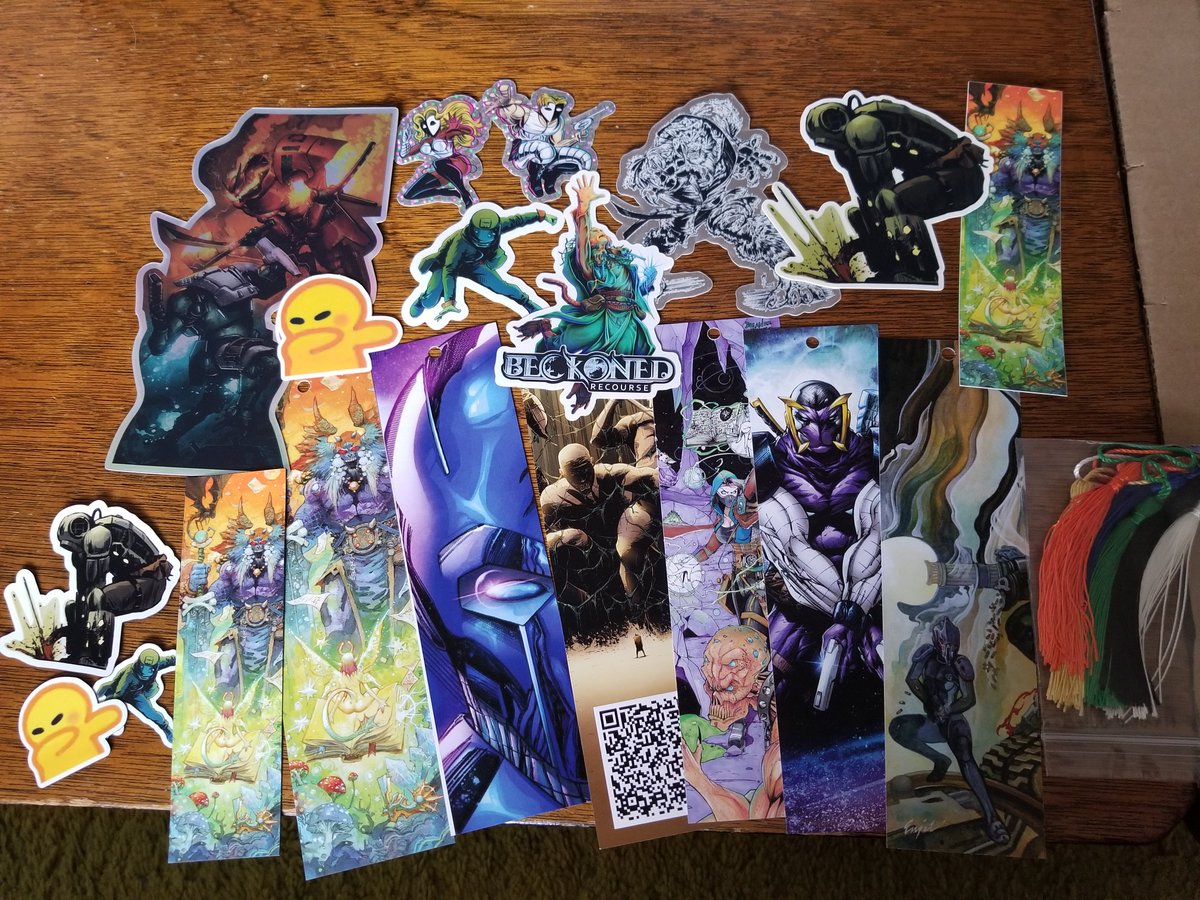 SumoThori's tweet photo. My bookmarks and stickers came in...yo, thanks @SnuggyJr. I count 8 stickers and 6 bookmarks, clearly the winner is #teamsticker (I got doubles of the bookmarks but that's cheating). https://t.co/5MxcALYUEb