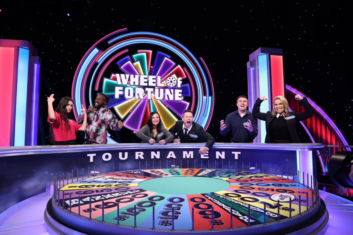 InkretibleNA's tweet photo. @WWE @WheelofFortune Can't forget these three, who were on set recording their episode when that group picture was taken! #TheWheelDeal fam leaves no one behind ✊️ https://t.co/bGSEHh06a3