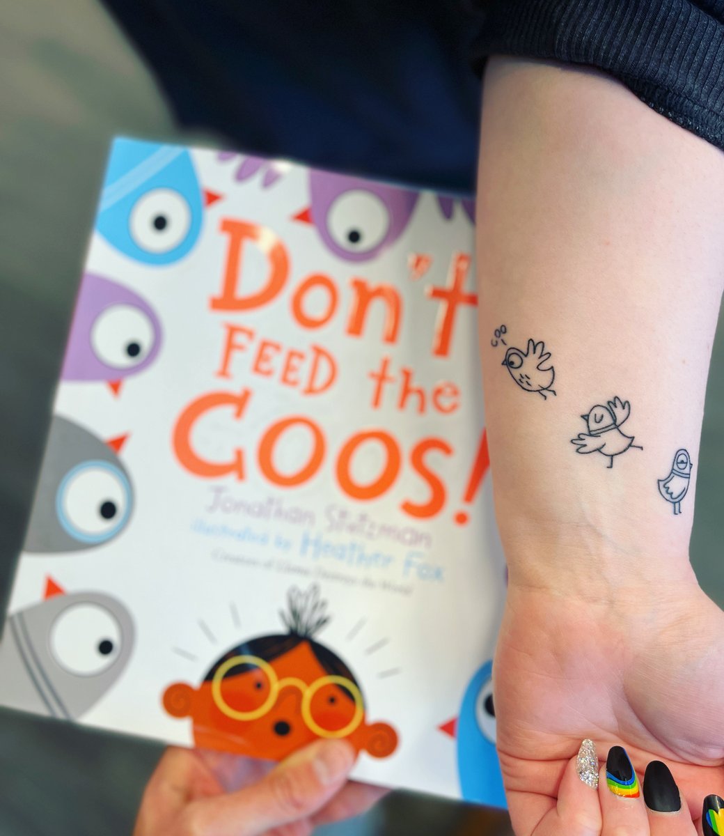 Librarians are the coolest! 

Check out this awesome DON'T FEED THE COOS! inspired tattoo that @MrsGEPainter got on her arm 😮

Amazing to see @adoodlefox's adorable art and characters as tattoos, but also, Grace... be careful about the (you know) "coo poo".
