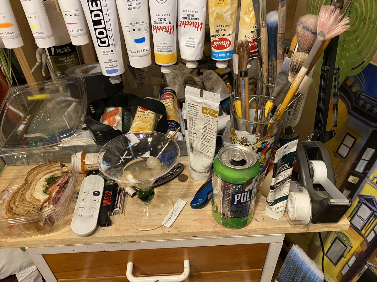 Artist cart: half a roast beef salami sandwich #pickelsdeliSTL, #bombaysapphire martini (dirty w/onions), bubbly water, a fortune from a cookie and a ton of paints and brushes.