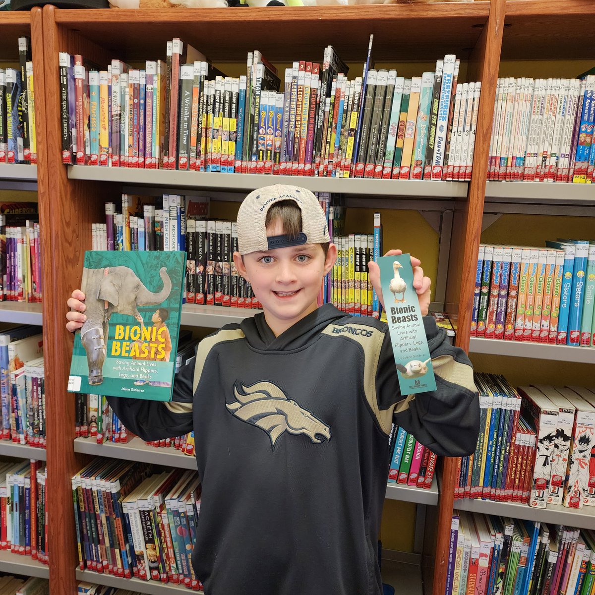 writerjolene's tweet photo. When one of my students comes to the library to show me that his mom bought a copy of my book, BIONIC BEASTS, it's a dream come true (posted with permission from his mom, who is a #STEM teacher and is planning to do a project based on BIONIC BEASTS soon)!
#kidlit #STEMeducation https://t.co/BJXKZniDuy