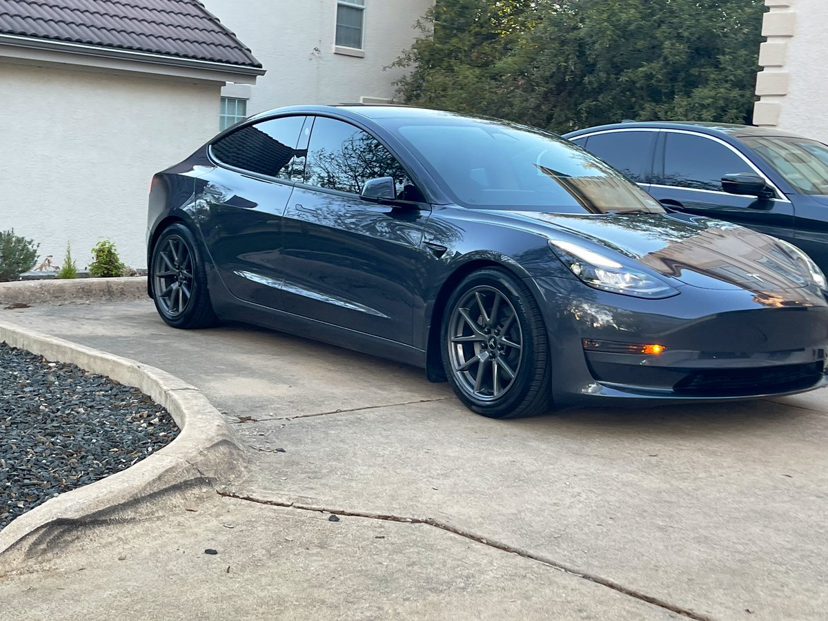 kaloo79's tweet photo. Dropped the Model 3 SR a few inches. Finally less of that horrible wheel fender gap. Aero wheels doing a decent job sitting flush @hrsprings @Tesla #HRSprings #teslamodel3 #model3sr https://t.co/m6L29RBnrS
