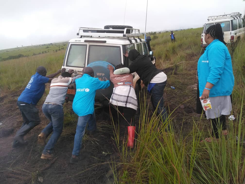 Perfect illustration of the old adage "Unit is strength." <a href="/WFPDRC/">WFP DRC</a> and <a href="/UNICEFDRC/">UNICEF en RDC</a> cars stucked on their way to  Mobba, Tanganyika Province 🇨🇩. Poor road conditions is the first challenge to overcome. But we always reach our final destination. Beneficiaries satisfaction matters!