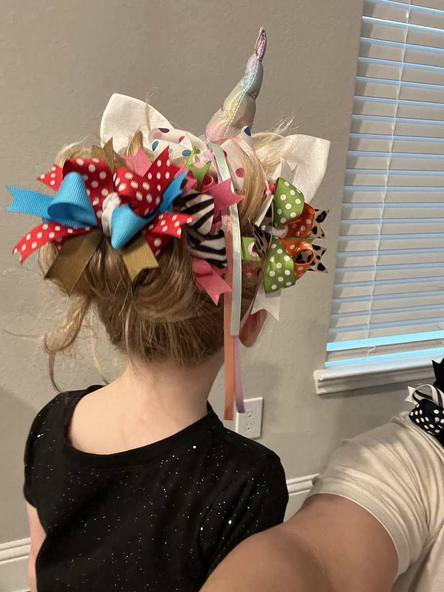 Her dream day! Getting to use so many colorful bows! Reading makes us laugh! #crazyhairday #TomballReads