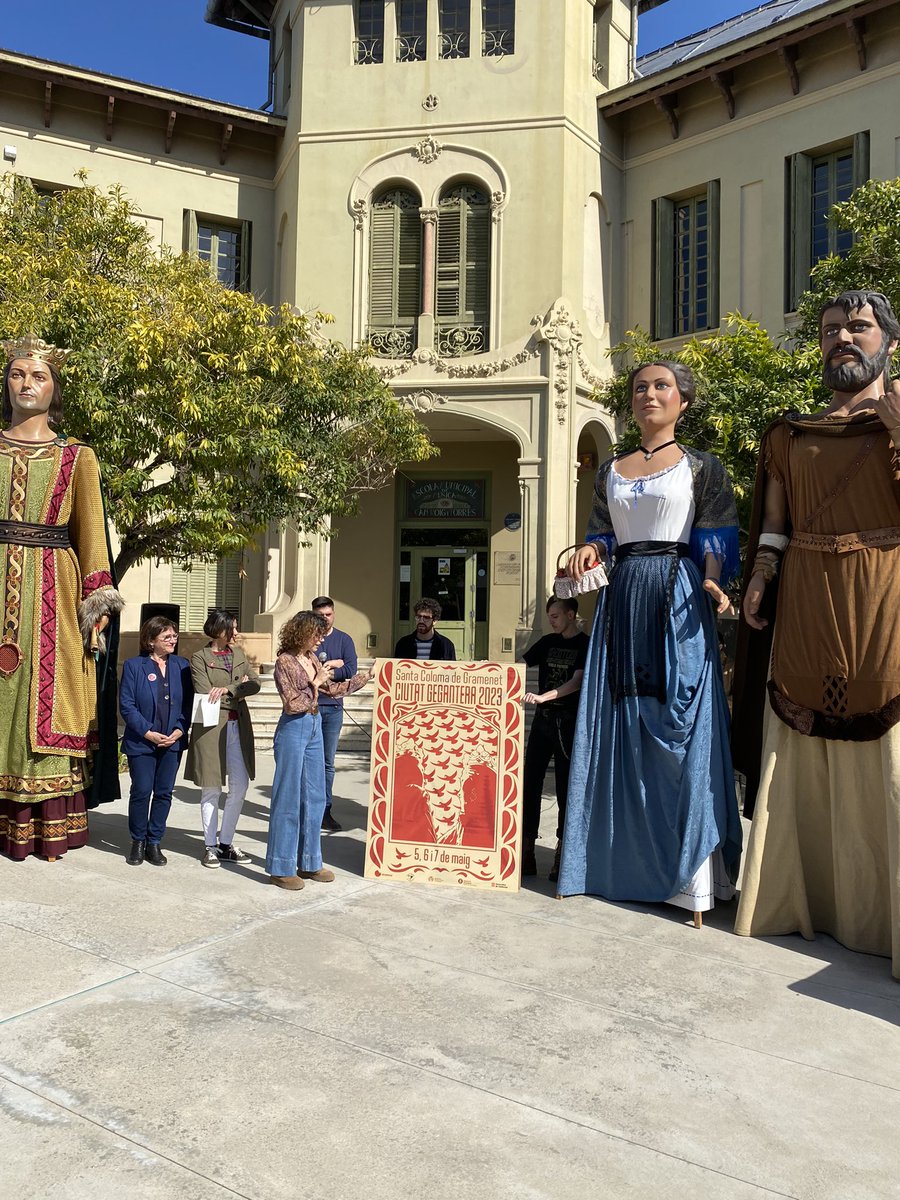 scgramenet's tweet photo. La dissenyadora Marta Aguilera presenta el cartell commemoratiu de la designació de #santacoloma com a Ciutat Gegantera 2023 https://t.co/4iZvwUWsLz