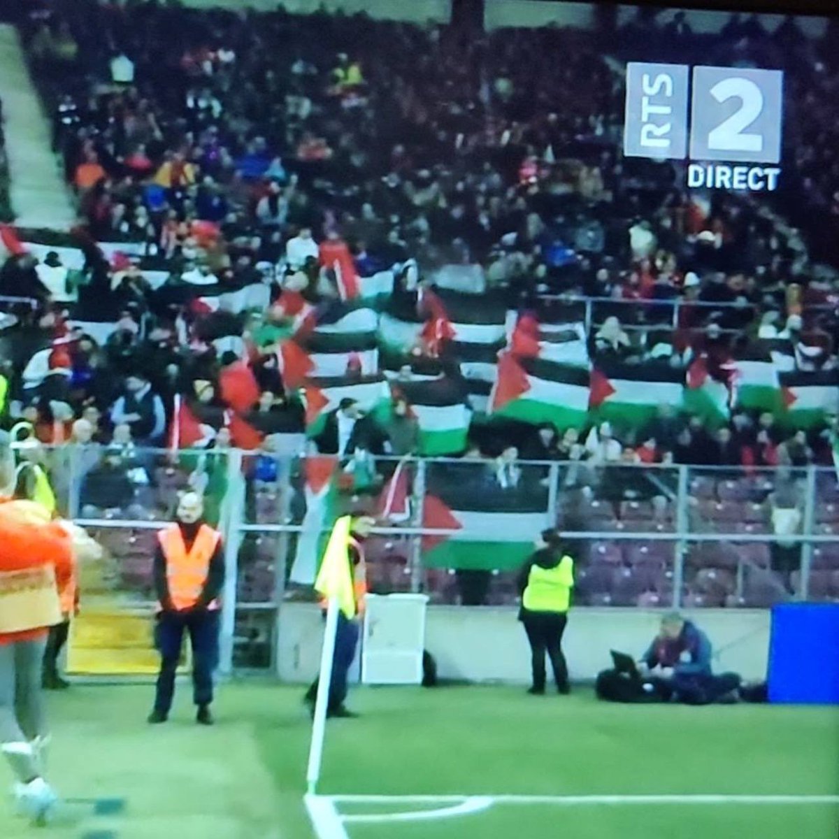 SaraReyi's tweet photo. Football fans raise over 100 Palestinian flags during Switzerland-‘Israel’ match in Geneva. https://t.co/41DF5pjWYk