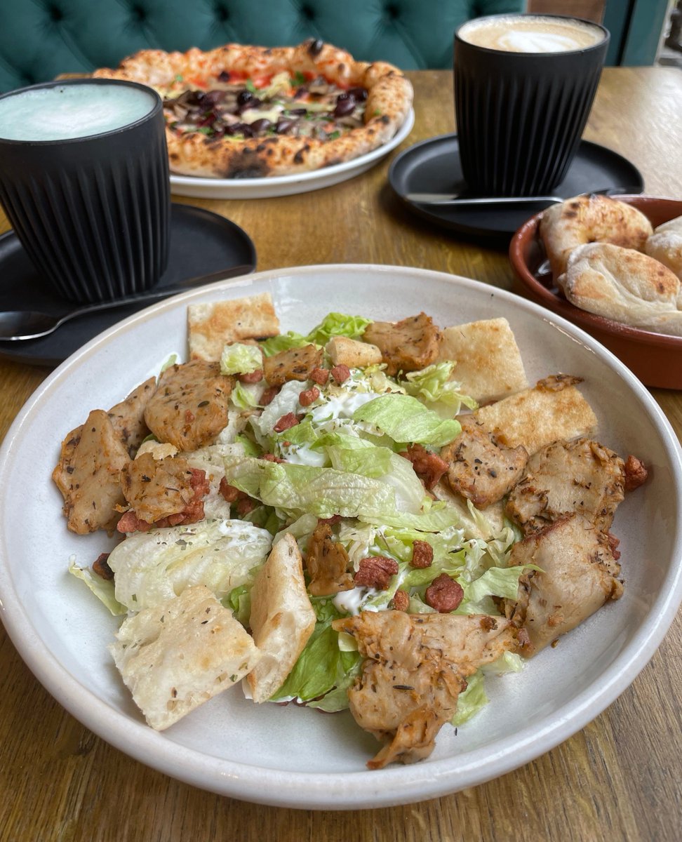 Our Caesar Salad 🥗 Lettuce with garlicky croutons, tossed in a creamy dressing, with Heura chicken, pancetta, hemp parm. Enjoy any three dishes from our day-time menu for only £18! - purezza.co.uk #veganuk #caesarsalad #purezza