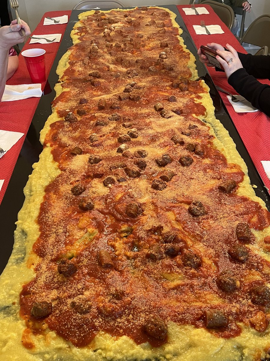 My family’s #italian tradition. Polenta covered in delicious homemade sauce, meatballs and sausage served on a board. @Alyssa_Milano you familiar with this 🇮🇹 #Italia #italian #italianfood #FamilyTradition #Heritage