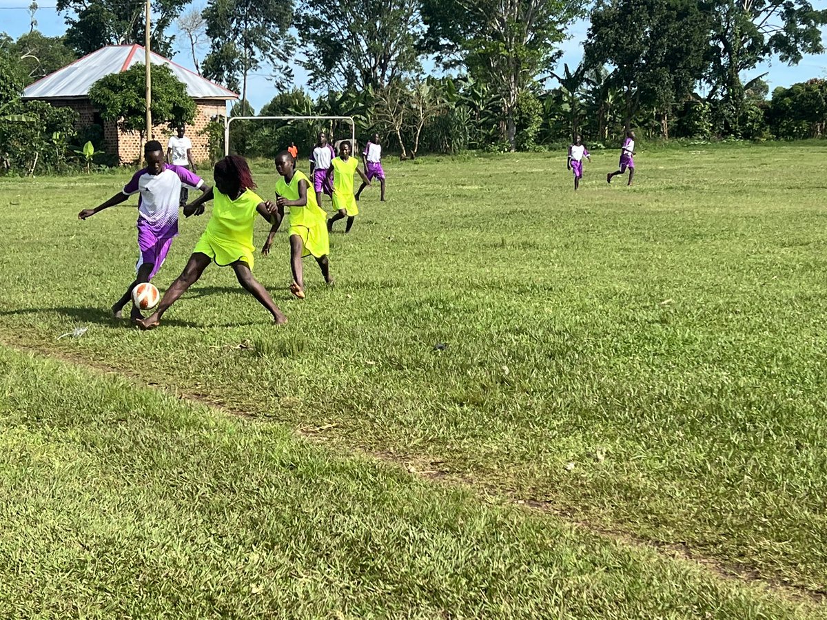 action4hU's tweet photo. Team huddles before the girls took the boys on in football. @action4hU uses sports galas as a mobilisation tool to reach young people in remote areas with proper SRH information and support their socio economic participation. #EmbraceEquity https://t.co/8PqDesS36I