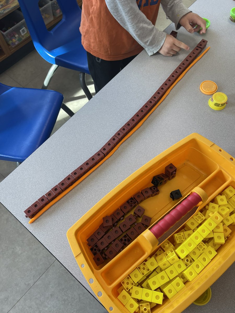 oodgrade1's tweet photo. Who can make the longest snake? So far we have one that measures 38 snap cubes! https://t.co/Mm6axlFHtx