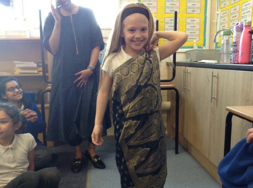 latimerprimary's tweet image. Y4 learning how to put on traditional Indian clothes....it's more complicated than it looks! #latimerRE