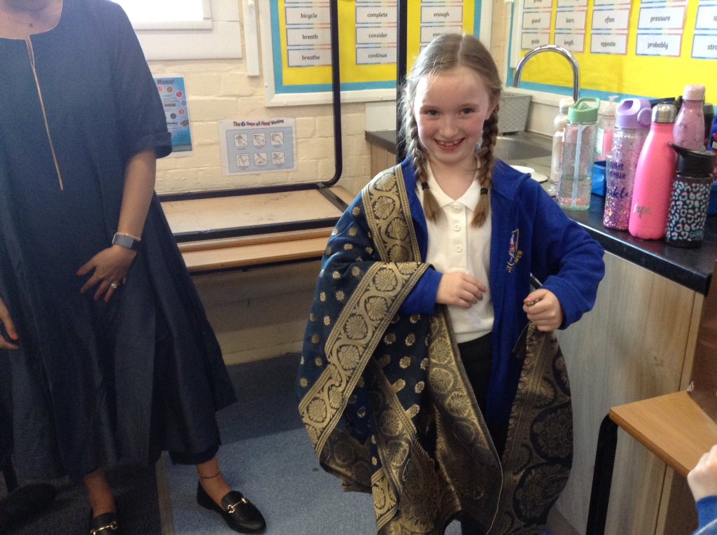 latimerprimary's tweet image. Y4 learning how to put on traditional Indian clothes....it's more complicated than it looks! #latimerRE