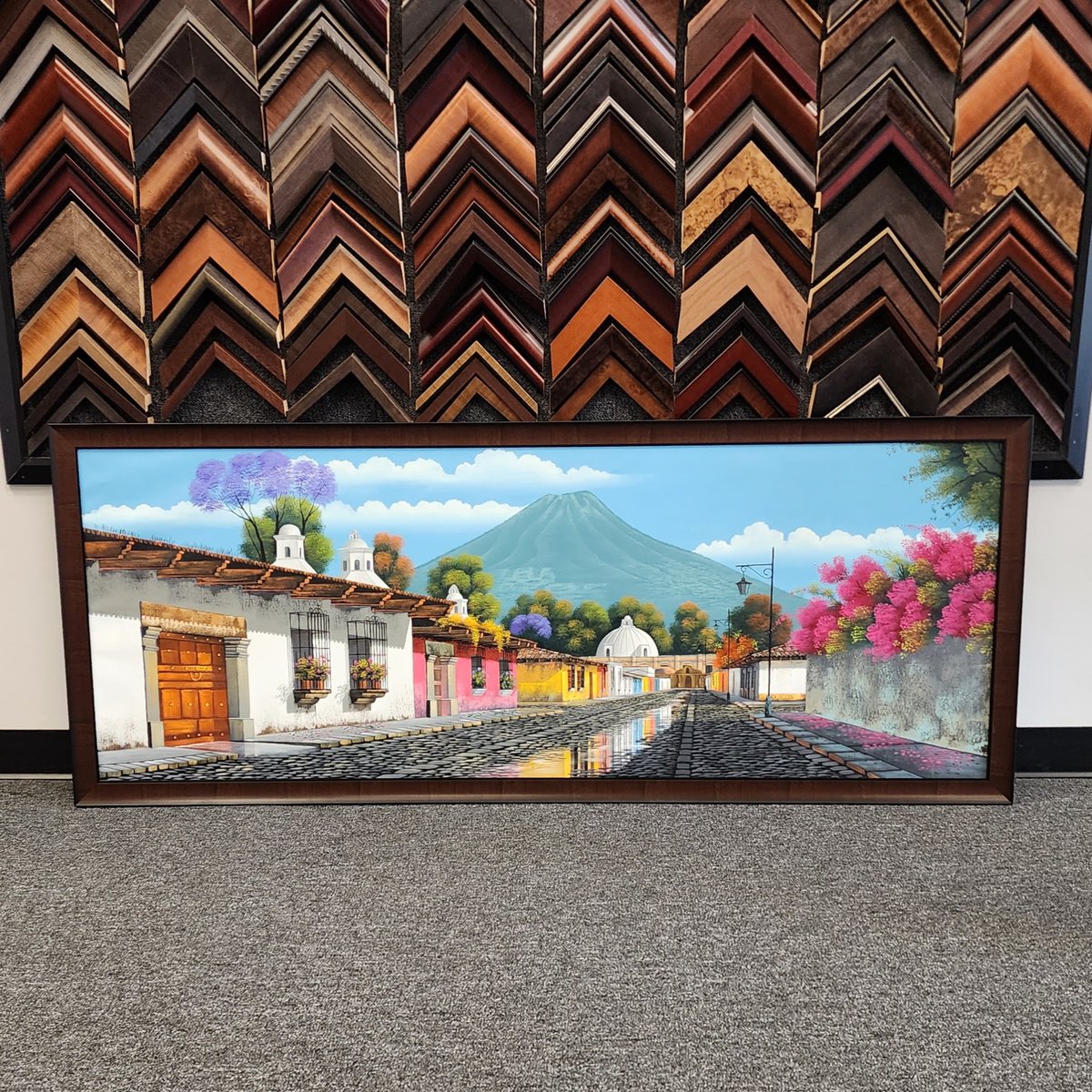 FastFrameDurham's tweet image. A customer brought in a large rolled up canvas bought overseas. Wanting it stretched and framed my customer selected this nice @ampfframes brown frame to compliment the art and his decor #canvas #Durham #art #travel
