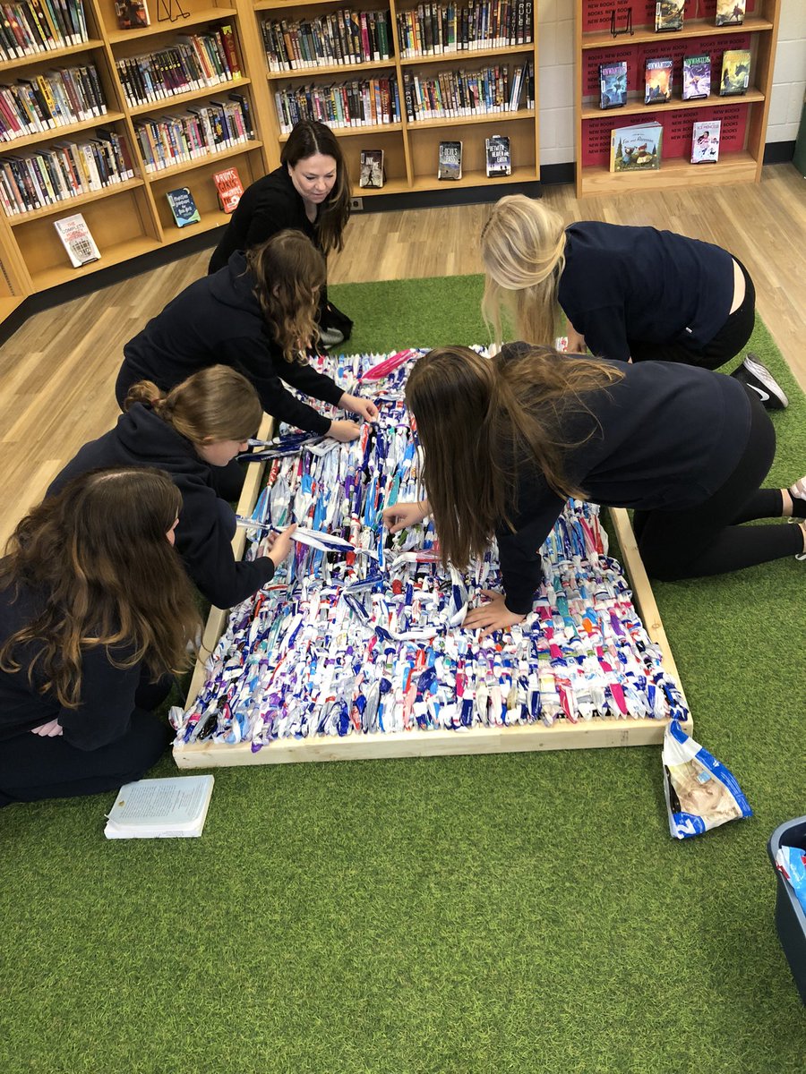 MrsYoung_grade6's tweet photo. Our wonderful librarian @LibraryStTims teaching a group from our class how to weave milk bags into mats to send to other countries @StTimothyHCDSB https://t.co/k9ddsUvsKU