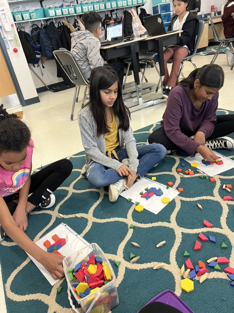 Ss used tangrams to create a picture by subdividing polygons. Some students came up with 4 different ways for 1 picture!