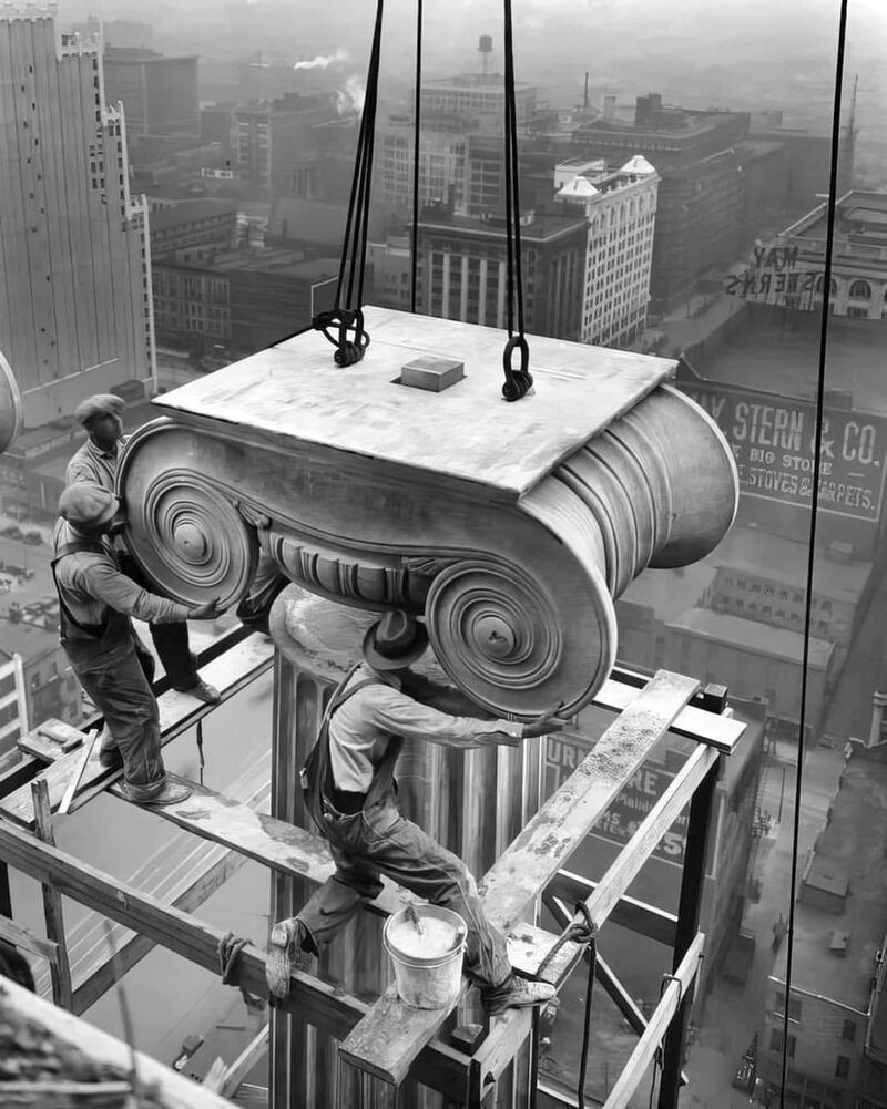 GreeceInUSA's tweet photo. Greek Revival, is an architectural movement that revived the forms and styles of ancient Greek architecture. In this photo by W.C. Runder, workers are installing a #Greek Revival architectural column on the Civil Courts building in St. Louis, Missouri in 1928. https://t.co/nCRiCMbR60