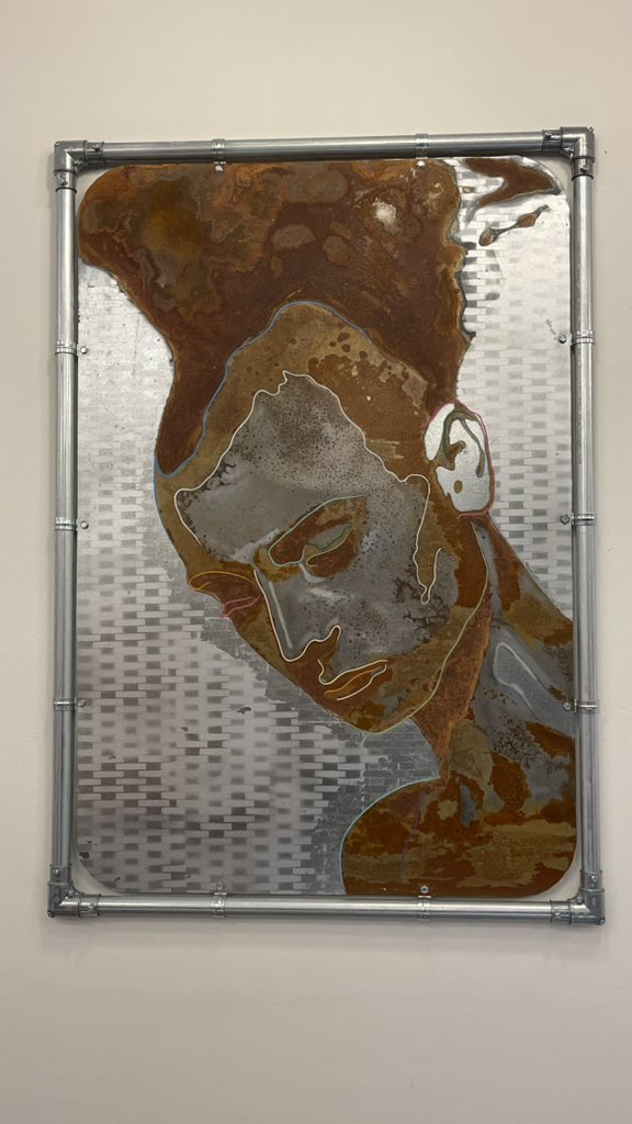 Art on display. Rust with paint highlights and definitions. <a href="/cafegrumpy/">Cafe Grumpy</a> in Financial District. Artist is Tsuyoshi Suzuki.