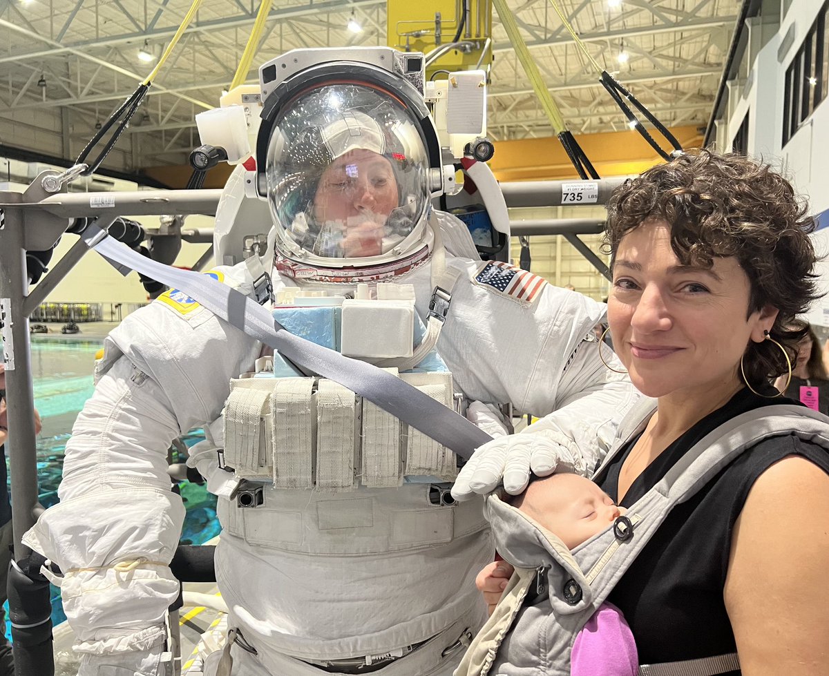 An impromptu #takeyourdaughtertoworkday to round out #womenshistorymonth . Her first #spacewalk training with a spacesuit glove familiarization by 8 Ball classmate @AstroHague at @NASA_Johnson. #workingmom