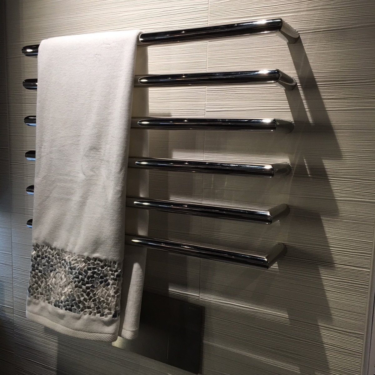 Towel warmers lower laundry loads and offer a daily warm embrace  #towel #towelwarmer #bathroom
