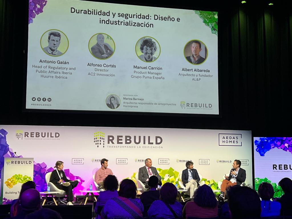 rebuildexpo's tweet photo. Durabilidad y seguridad: diseño e industrialización. @Hormipresa @HuurreIberica @Ac2Innovacion @grupopuma #ALyP en el Auditorium @aedashomes de #REBUILD2023 https://t.co/V1ktjDSMbX