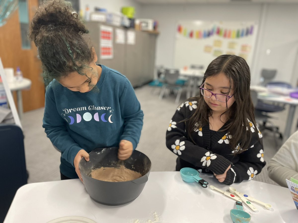 This week we have been learning about recipes! These students read a “fudgy waffle brownies” recipe from a cookbook and learned about units of measurement as they baked. They did a great job collaborating to make some treats from themselves and delivered some around the school!