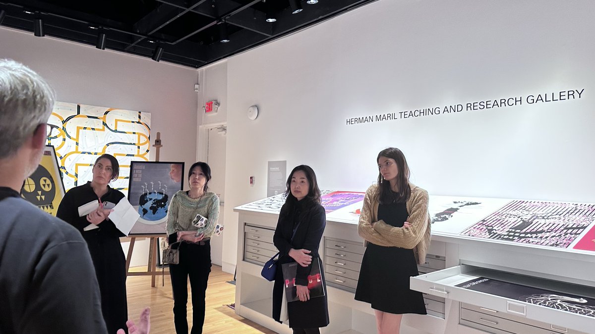 UMDArtGallery's tweet photo. Prof. Alicia Volk & her graduate seminar "No More Hiroshimas! Art & the Atomic Bomb” stopped by the Herman Maril Teaching & Research Gallery this week to view selections from our "Poster Weapons for Peace " collection. #artsforall #permanentcollection @UofMaryland @umd_arhu https://t.co/mBTAmlBZXH