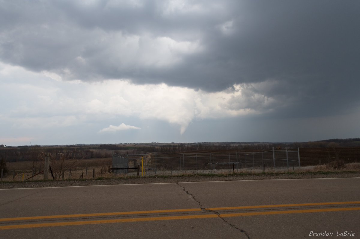BrandonLaBrie's tweet photo. Great first chase to knock the rust off yesterday. Thought it was going to plant on the first attempt, but took it’s sweet time to produce. Still offered a unique view looking through the large RFD cut, to see the occlusion and tornado on the northern end. Textbook. #iawx https://t.co/hRhxxuIXC3