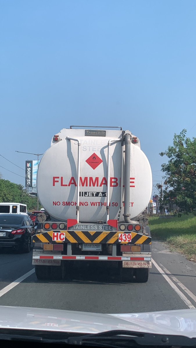 dinflaviano's tweet photo. Two (2) speeding gas trailers (SFOil Incorporated) cutting off cars here at @NLEXexpressways while in traffic. Hope u can reprimand https://t.co/9kyzGtk3On