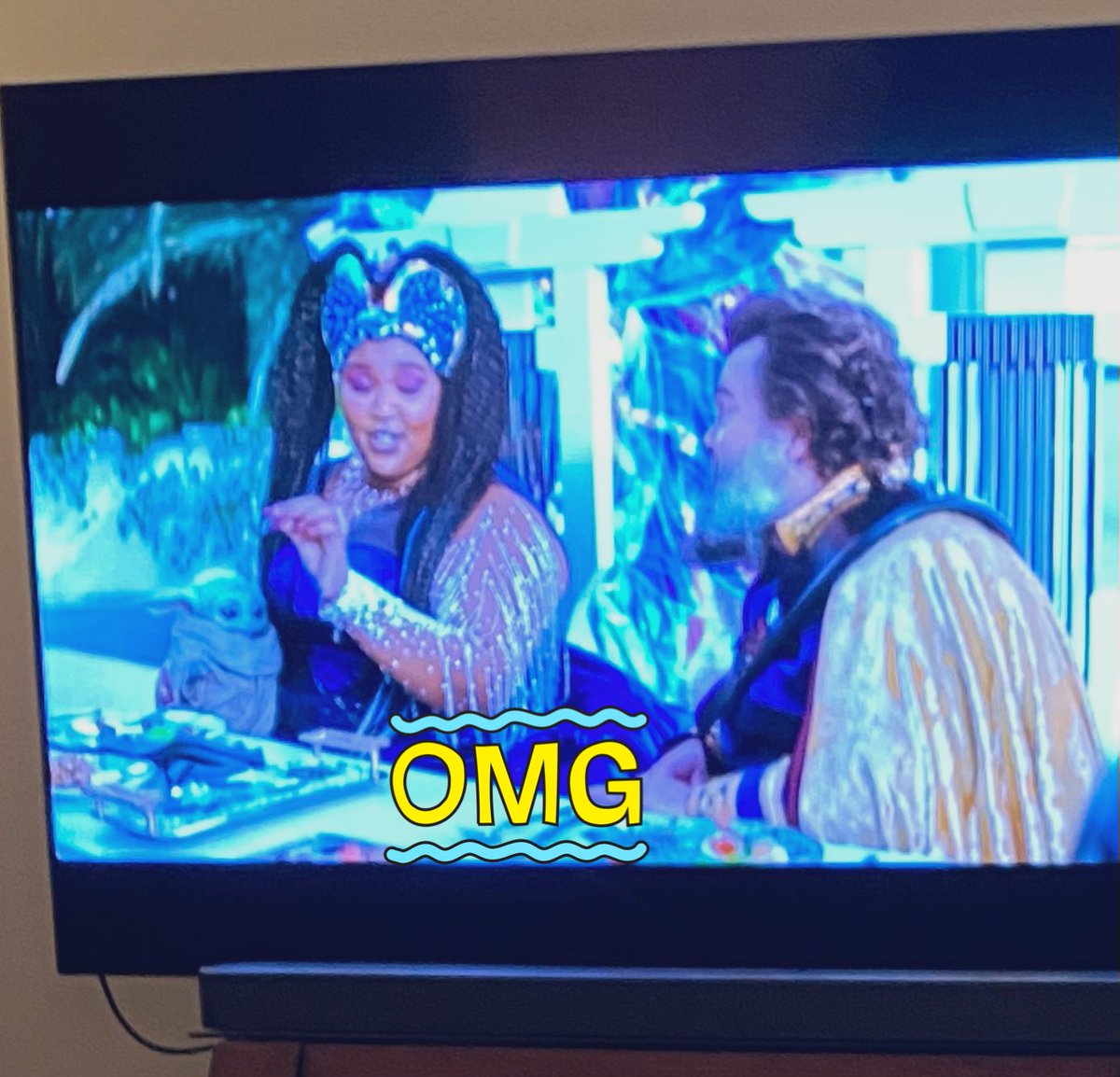 aubsies22's tweet photo. @lizzo making us all jealous in this episode of #TheMandalorian  
She’s holding the baby!!! #Grogu @themandalorian 
Also cool to see @jackblack and @lizzo on #Mando! https://t.co/rBLKTHJ8Qg