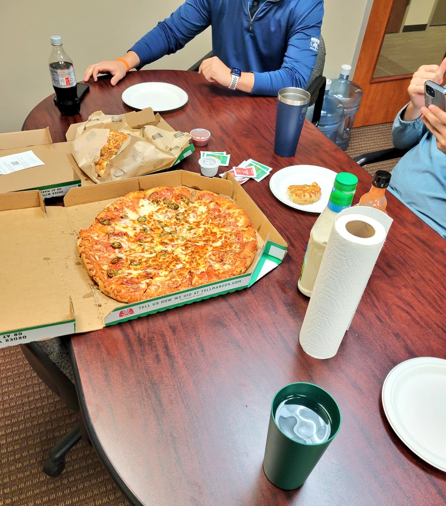 A tradition unlike any other. #TexasAm registration closing pizza while we build everything out. #golfadministration #growthegame