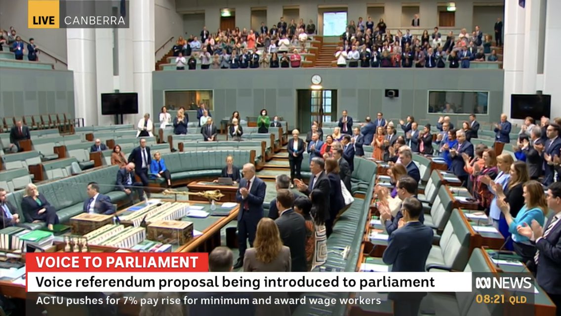 hughriminton's tweet photo. A telling moment, signalling the end of any pretence of bipartisanship.  A standing ovation for ⁦@MarkDreyfusKCMP⁩ from the Labor and cross-benches and the gallery - stony silence from the Coalition benches - as the AG introduces the #VoiceToParliament constitutional bill. https://t.co/4QbbnfEhuv