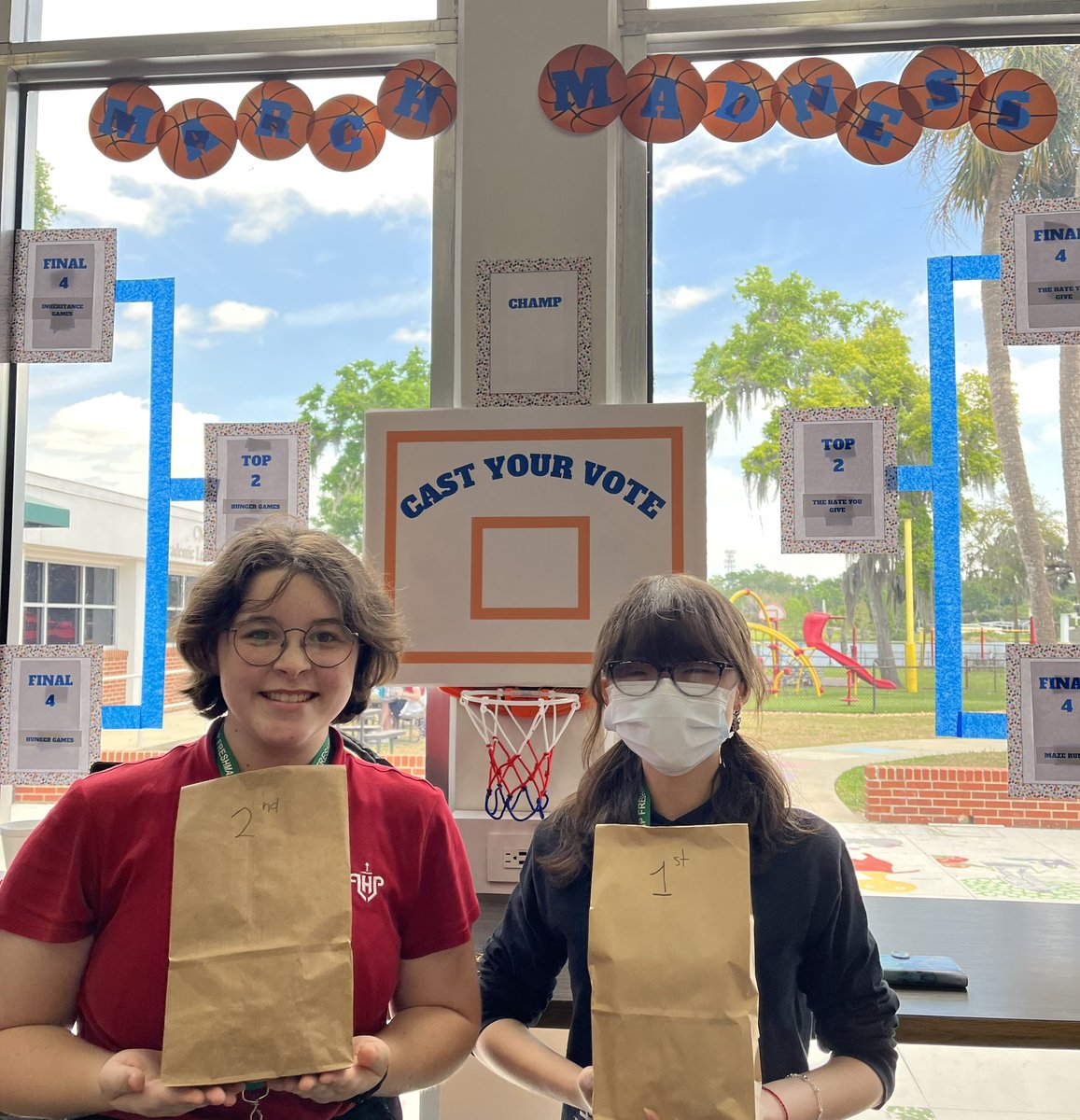 Library twist on March Madness- students filled out brackets for 16 most checked out books. Winners for a perfect and near-perfect bracket 🏆 #favoritebookhungergames <a href="/lhpsnews/">Lake Highland Preparatory School</a>