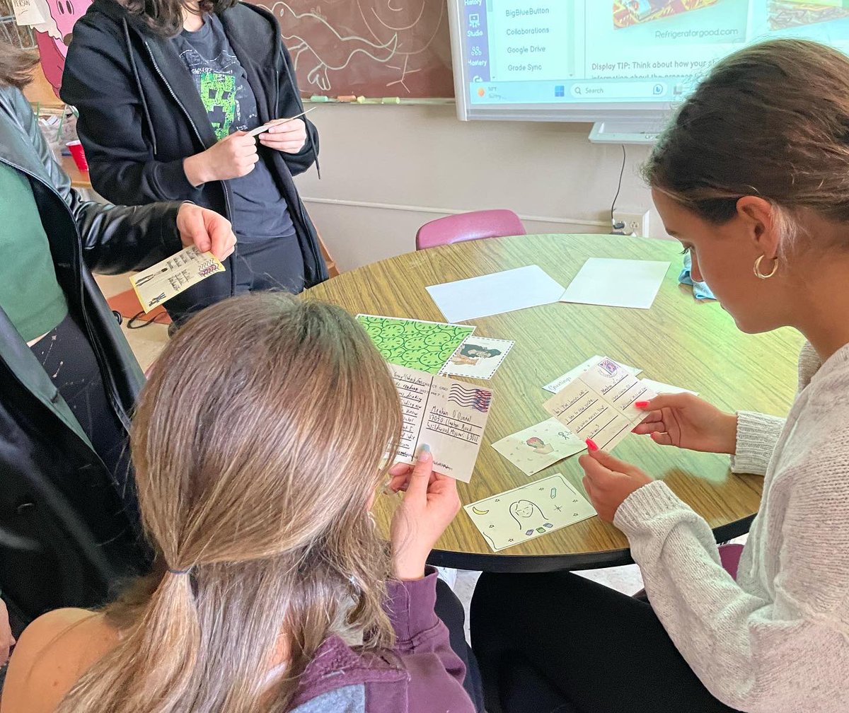 Graphic Design Advanced got their personalized postcards from their pen pals in Connecticut today! #connectedlancer