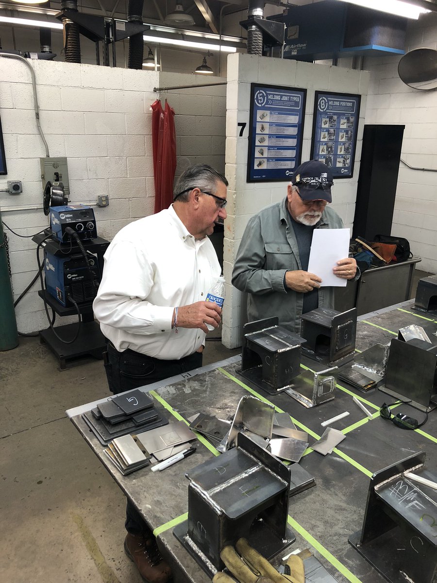 edelen_dan's tweet photo. #SkillUSA is in full effect @Delcastleths. Welding competition is heating up thanks to all of the supporters. Delcastle alum Bob Suppe 72’and Lenny Graves 72’ giving back to their career area as judges for the competition #nccvworks @drcomegys @coop_delcastths @Supt_Jones https://t.co/RrWRAF5flA