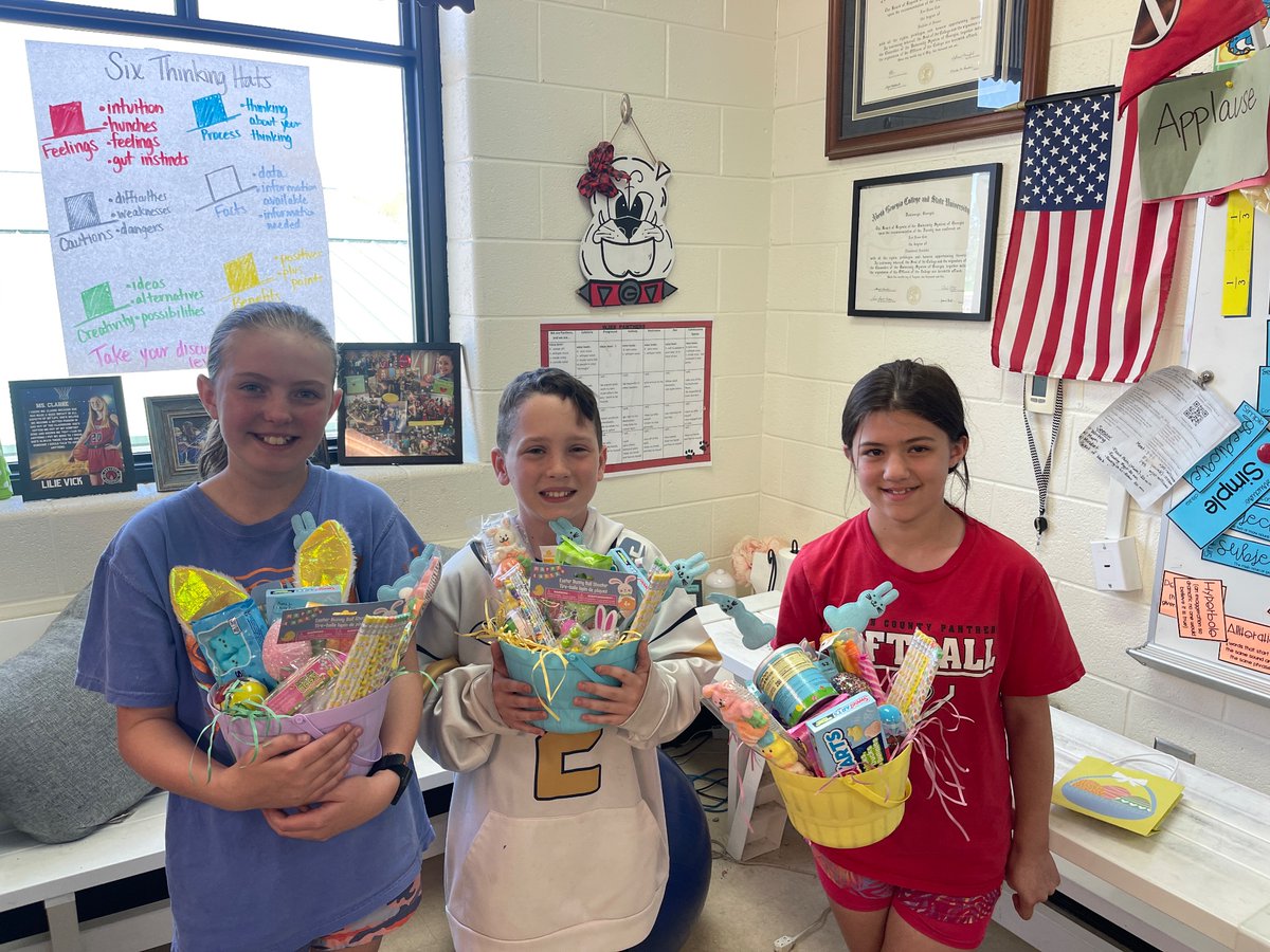 WJESClarke5th's tweet photo. Fifth graders still love egg hunts, and we need more practice with decimals and fractions——so why not merge the two?  Instant engagement as these kids had to earn being able to eat the candy, and the winning team won prize baskets! https://t.co/z33ypOkNfm