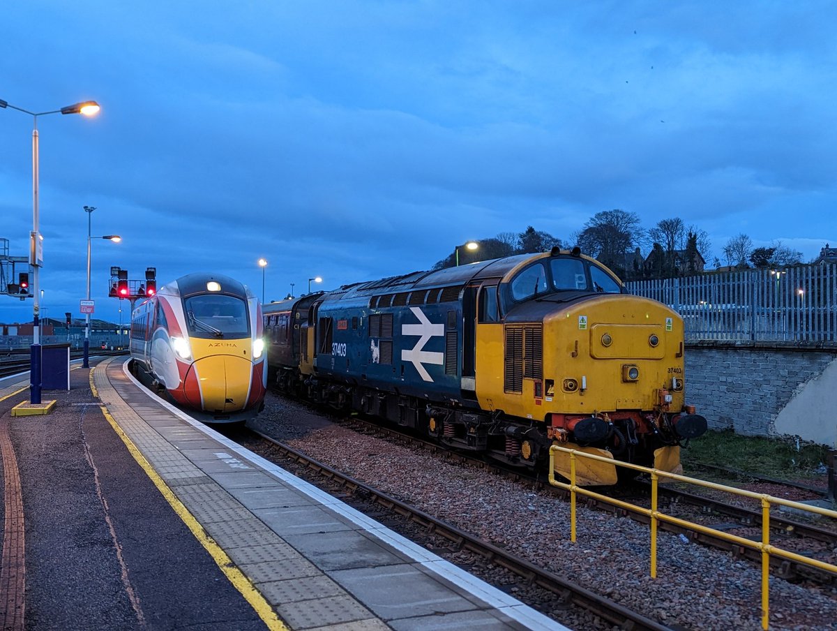 The Highland Chieftain arrives in Inverness alongside 37403 "Isle of Mull", ahead of its GBRf Charity tour to Kyle of Localsh tomorrow. 

One of three class 37s currently in the area.