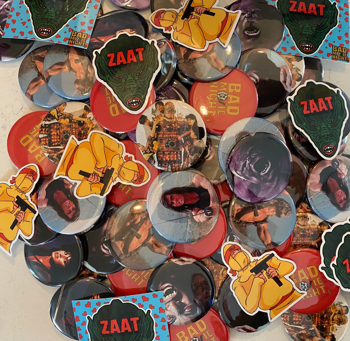 BadMovieNight1's tweet photo. Hey Sticker Club Patrons! Your first package is on its way! Get ready for a grabbag of pins and stickers made by our BMN artists. Will you get Ghoulio, Samurai Cop, or Robot in the Family? Who knows?! 

Want in on the fun? Join the Bad Movie Night sticker club for $5/mo! https://t.co/gXHlBIEtGg