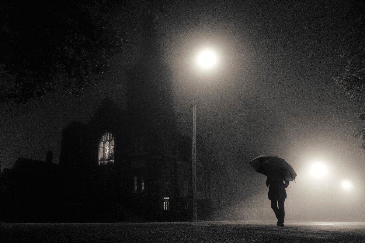 DougTruppe's tweet photo. #Umbrellas in the #mist. It’s the illusion of #romance, #mystery and a setting for a #filmnoir from the personal files of @agoodwinphoto. #DougTruppe #AndyGoodwinPhoto #NationalUmbrellaMonth #portrait #blackandwhite #bnw #noir #umbrella #fog #foggy #silhouette #misty #gothic https://t.co/O5aBr1eiu2