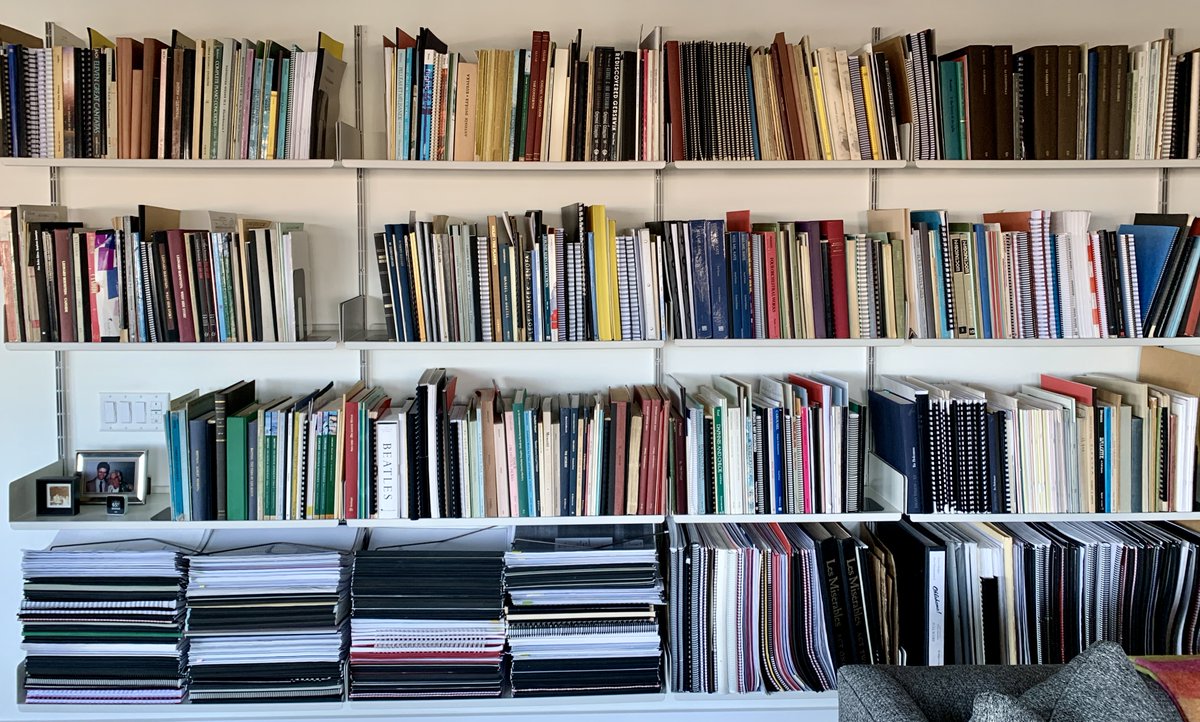 Here's every piece of music I have conducted since public performances resumed in Autumn, 2021 -- opera, classical, pops, musicals -- waiting to be re-shelved.

Just one problem (see second photo): no space left! Maybe it's time for a cull...