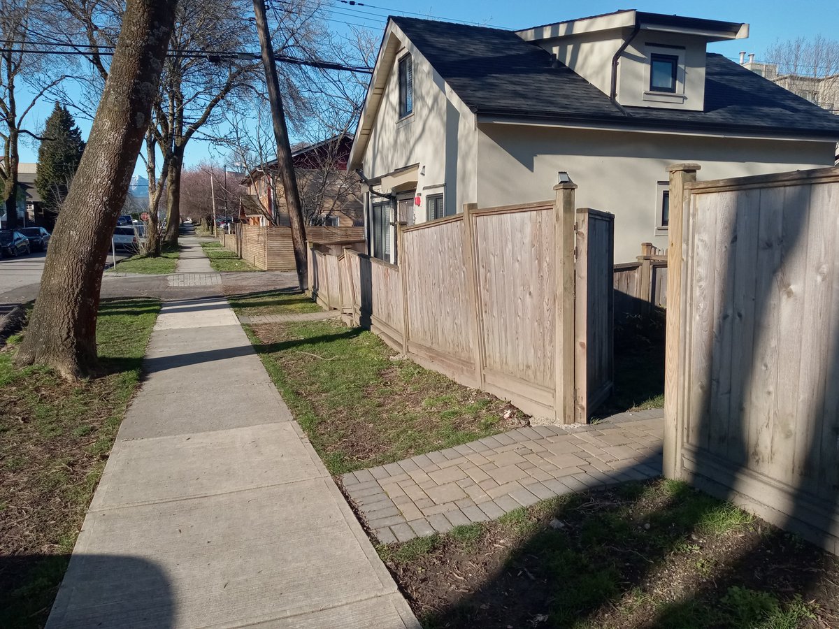 This house in Vancouver was built 5 years ago, but why is the fence so wonky? 

It's because this property is located in a former peat bog. Although newly built houses in peat bog areas are typically constructed with piles which stabilize the foundation, landscaping/hardscaping