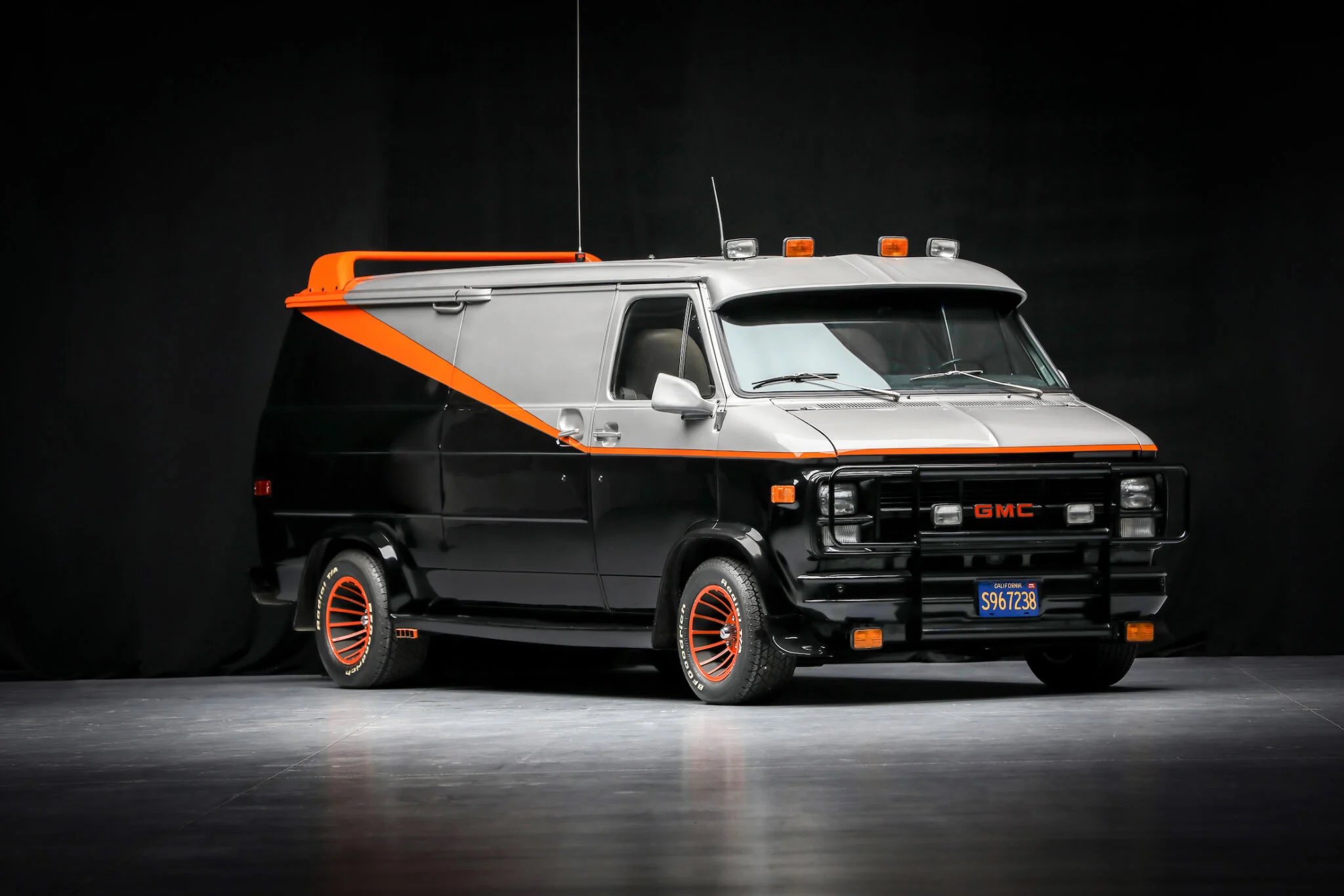 Black van with red stripe best sale
