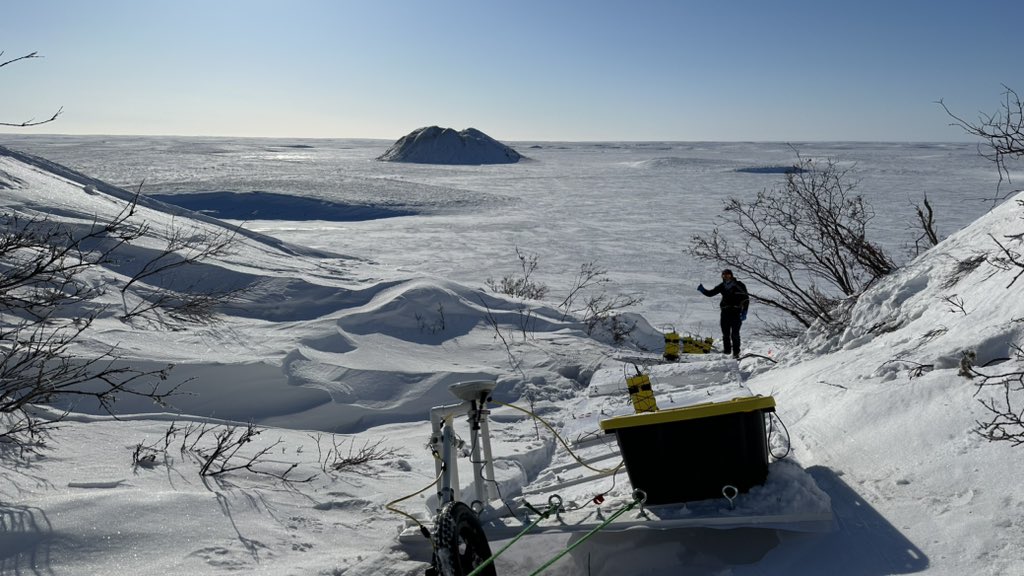 MinesGlaciology's tweet photo. @Cornell @CornellAstro research engineer Andy Mullen gives a thumbs up before our #gpr rig descends the steep side of #SplitPingo with #IbyukPingo looming behind. #pingostarr (we surveyed both today 😁) https://t.co/sfk20n0fZo