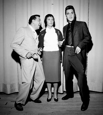 A reporter asked Elvis Presley where he learned his distinctive, some thought disturbing, body shakes. “From Louis Prima, of course,” he replied.

Elvis Presley in Las Vegas in October 23 1957 with Louis Prima and Keely Smith 

#louisprima #keelysmith #elvispresley #rocknroll