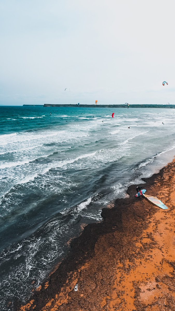GoTurkiye's tweet photo. The most swoon-worthy way to start a summer adventure: Catching the mellow waves in Aydıncık, #Çanakkale. https://t.co/j86nxrRcwv