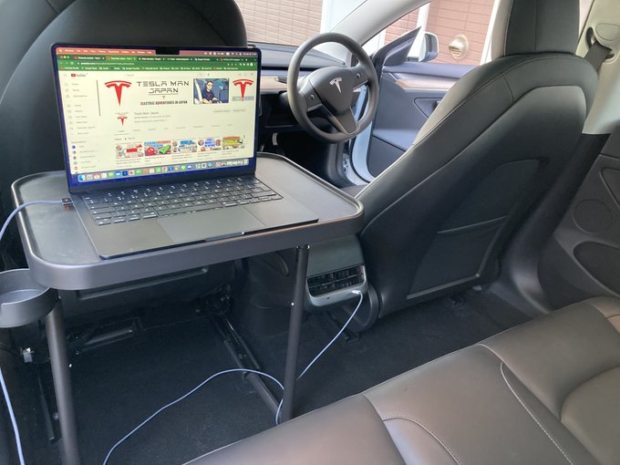 Working from home is easy in a Tesla! Or perhaps that's Work