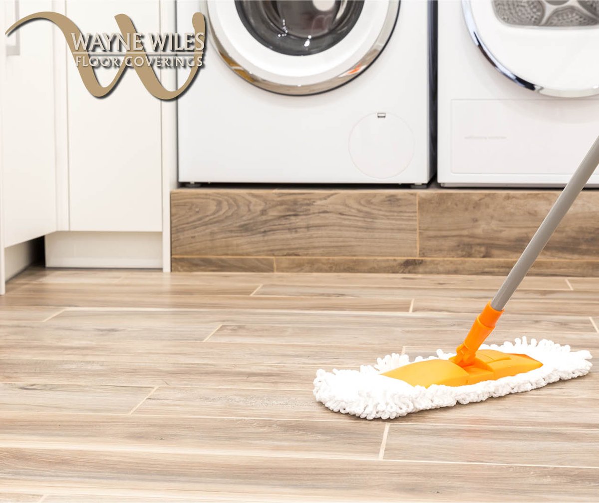 You want an amazing laundry room with easy clean up, get new hardwood tile floors at waynewiles.com  #waynewiles #floorcoverings #tilefloor #tilelove #flooringtrends #newflooring #flooringexperts