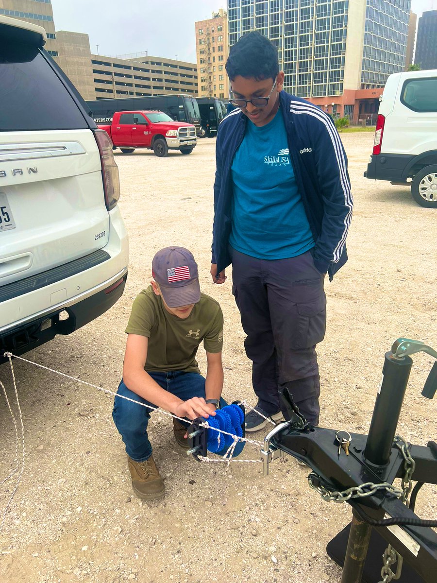 Car is in neutral and trailer chocked. Demonstrating moving a car with a 3D printed winch for SkillsUSA Additive Manufacturing competition. <a href="/prosperCTE/">Prosper CTE</a> <a href="/ProsperHS/">Prosper High School</a> @SkillsUSA_PHS