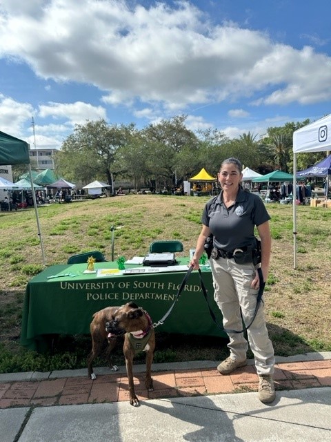 USFPDTampa's tweet photo. Check out pics from USF’s Bull Market, where we saw an impressive display of affection as students &amp; staff visited with Bailey &amp; her handler, Officer Marchesano.
We thank our USF community for their support. #USFPD https://t.co/FV6RcJrBb8