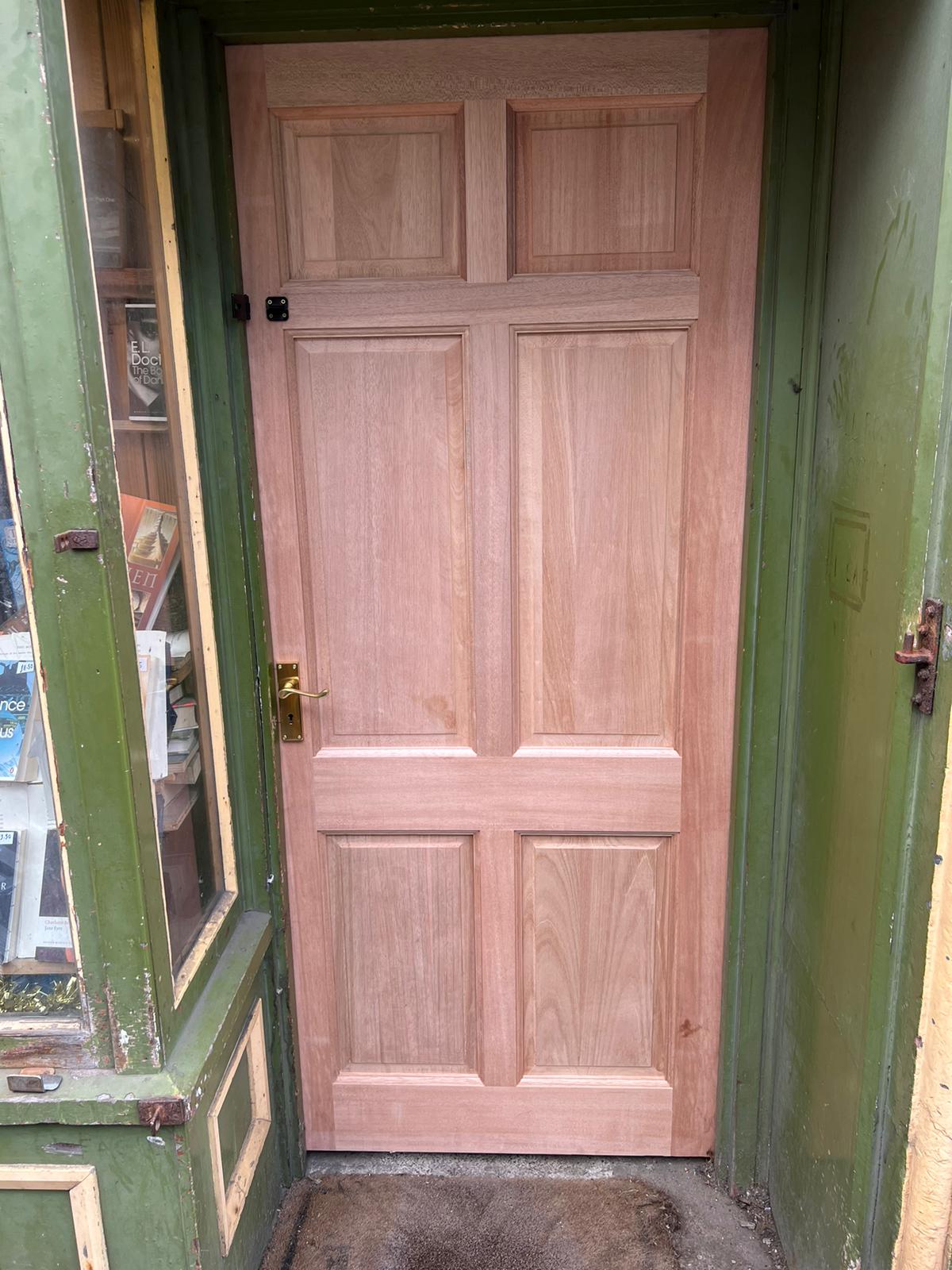 armchair books on Twitter "This is our door! It's a temporary door made of mostly permanent