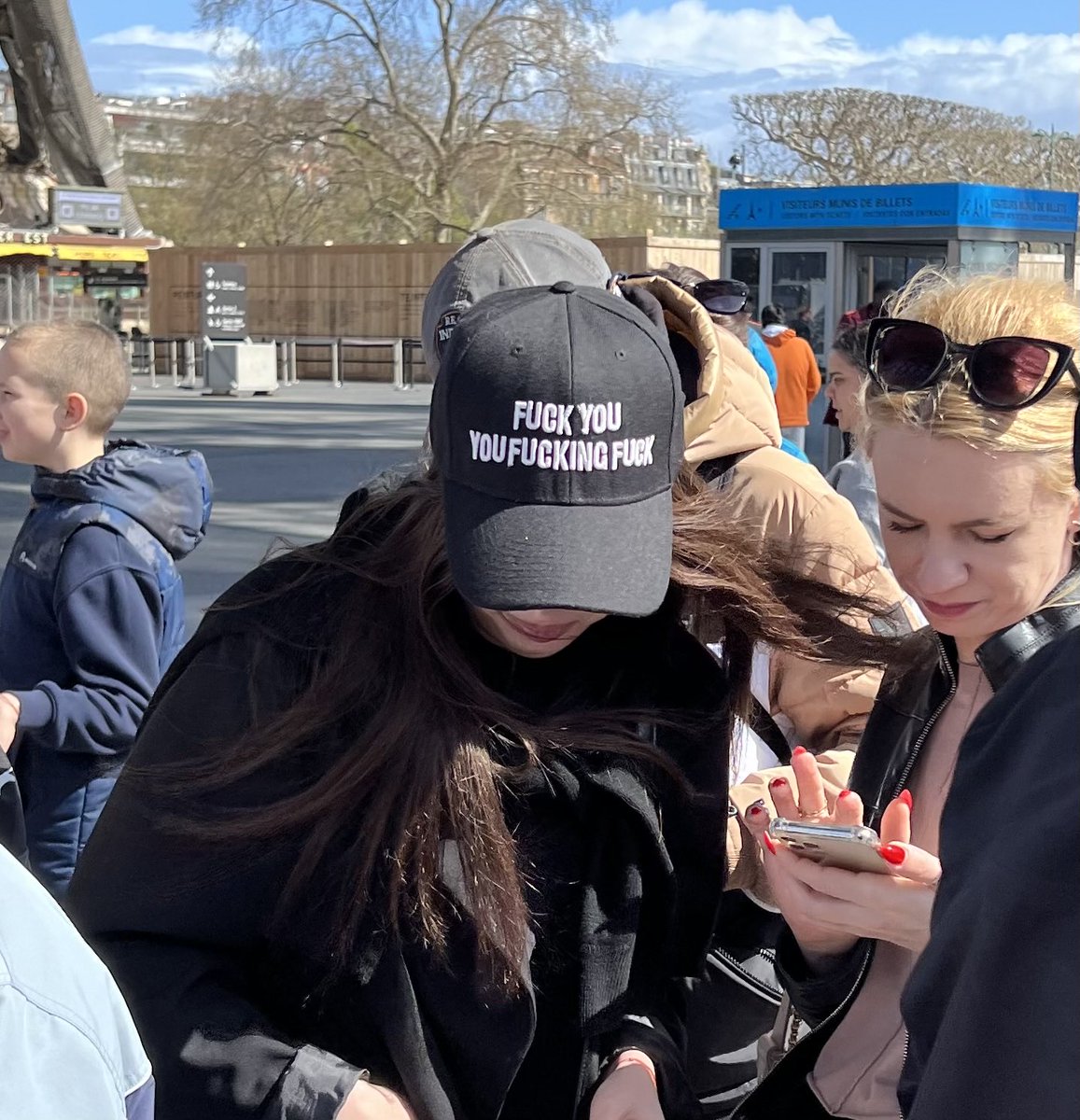 phillipalden's tweet photo. “Klassy.” I don’t know if she’s trying to be edgy or provocative but it just comes off as pathetic. If she walked into a restaurant or store I owned I’d refuse to serve her. Her friends were equally appalling. This was at the Eiffel Tower. Lots of kids around. https://t.co/PKqyGiAECo